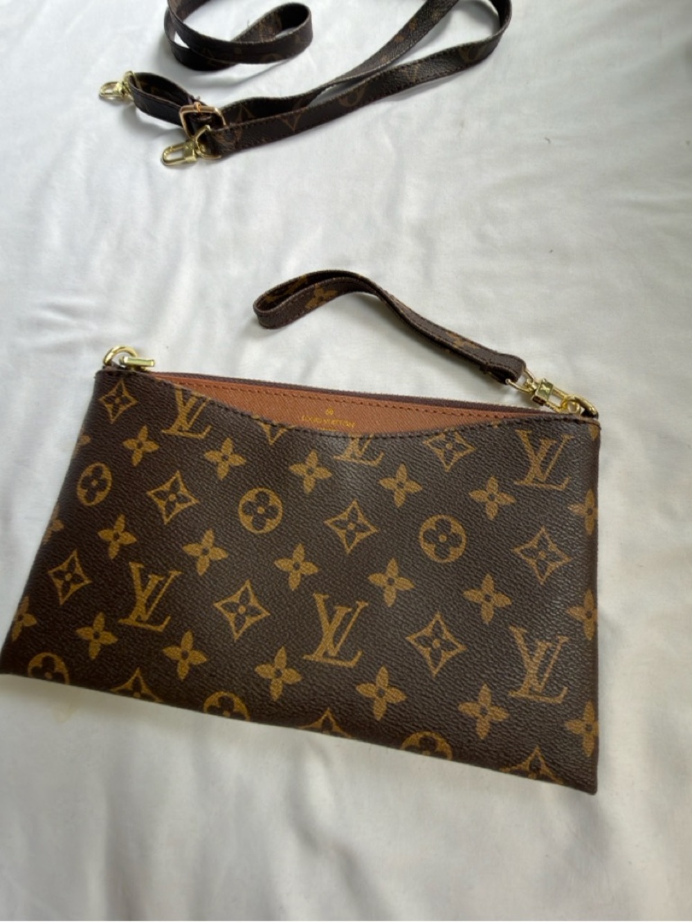 Louis Vuitton doupe Monogram Clutch in Brown and Tan